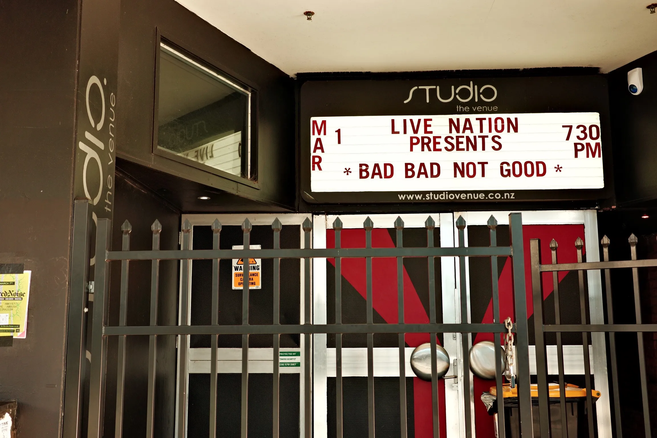 Photo of a BADBADBOTGOOD show sign at Studio
