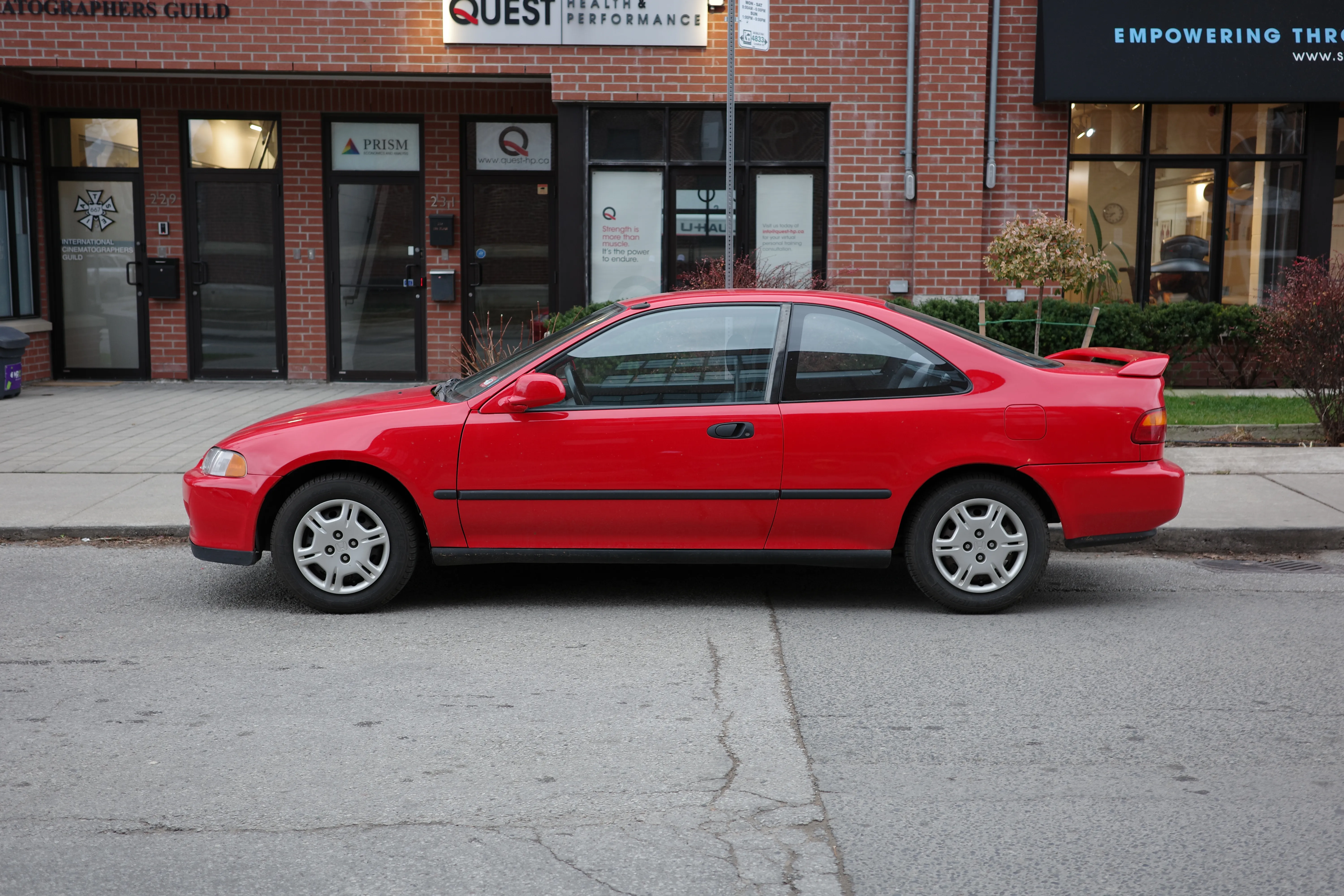 Photo of an old red Honda Civic